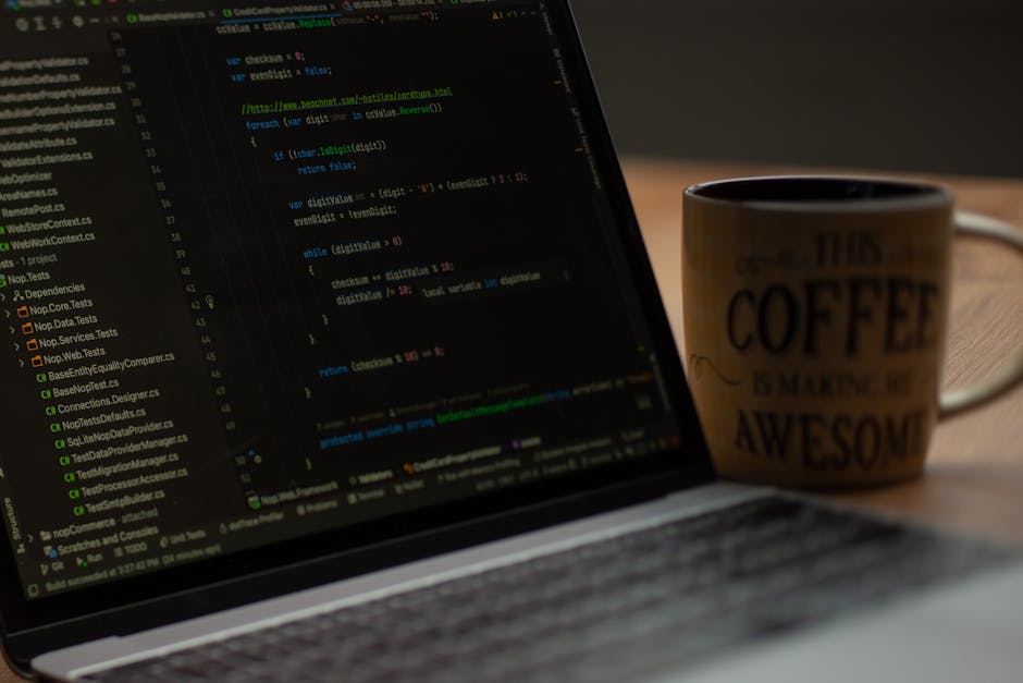 A detailed close-up of a computer screen displaying lines of colourful coding and programming language text, with the text including various CSS styles such as margin, border, background-color, and pa